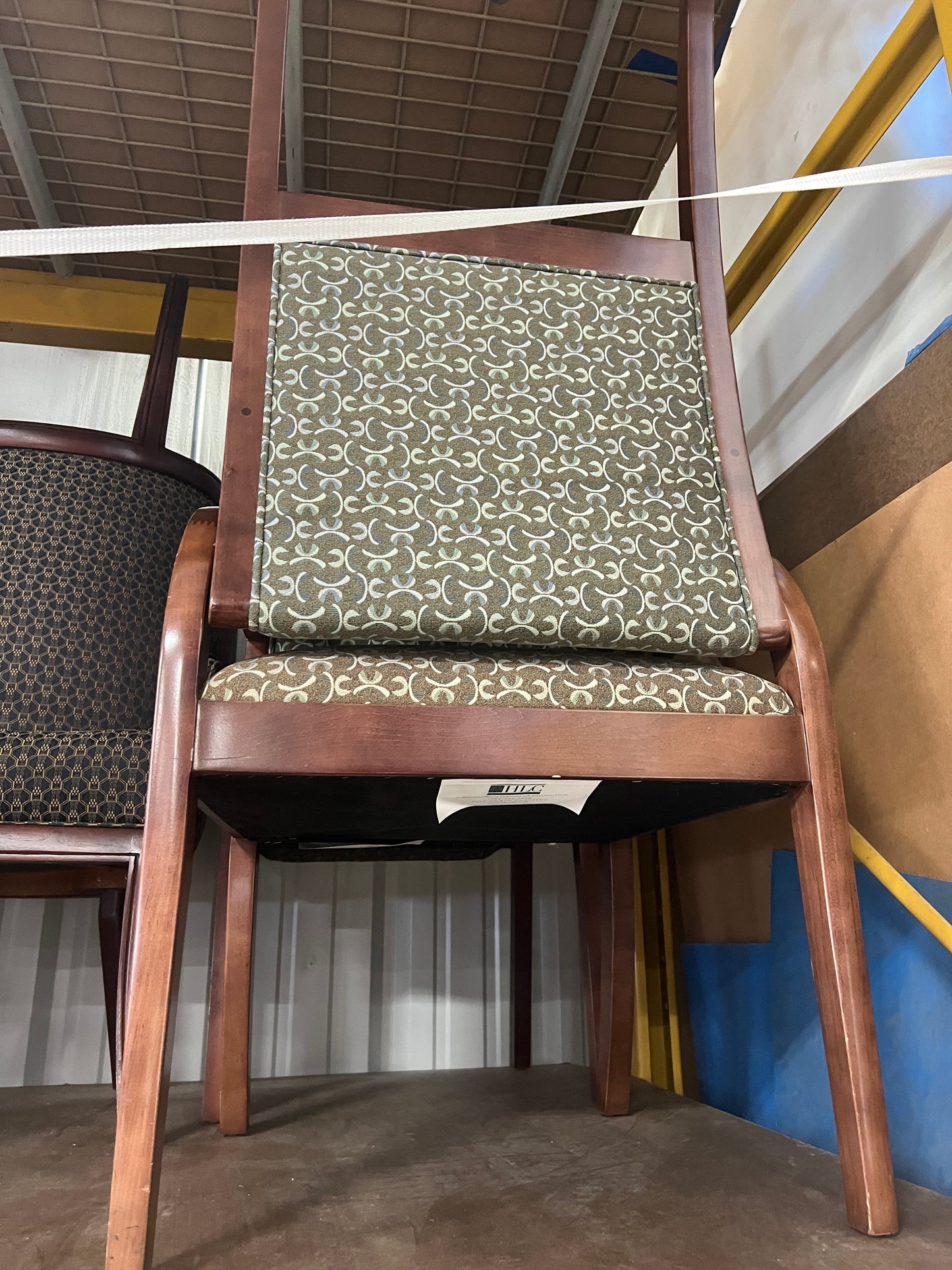 Chair: Stationary chair, dark wood with olive green patterned fabric