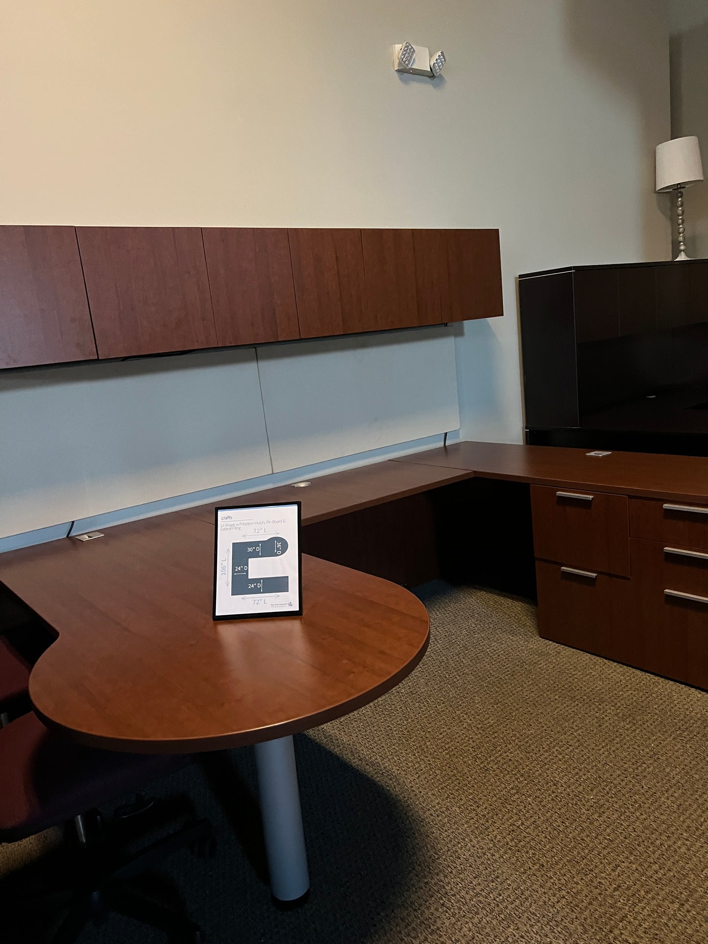 Desk: Paoli u shaped wood desk with floating cabinet and pin board