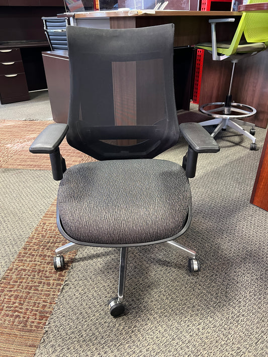 Chairs: Task chair on metal casters. New  seat.