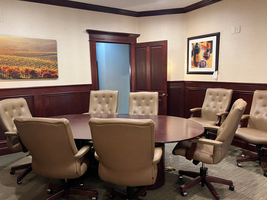 10 foot conference table with 10 HON pin tucked leather chairs