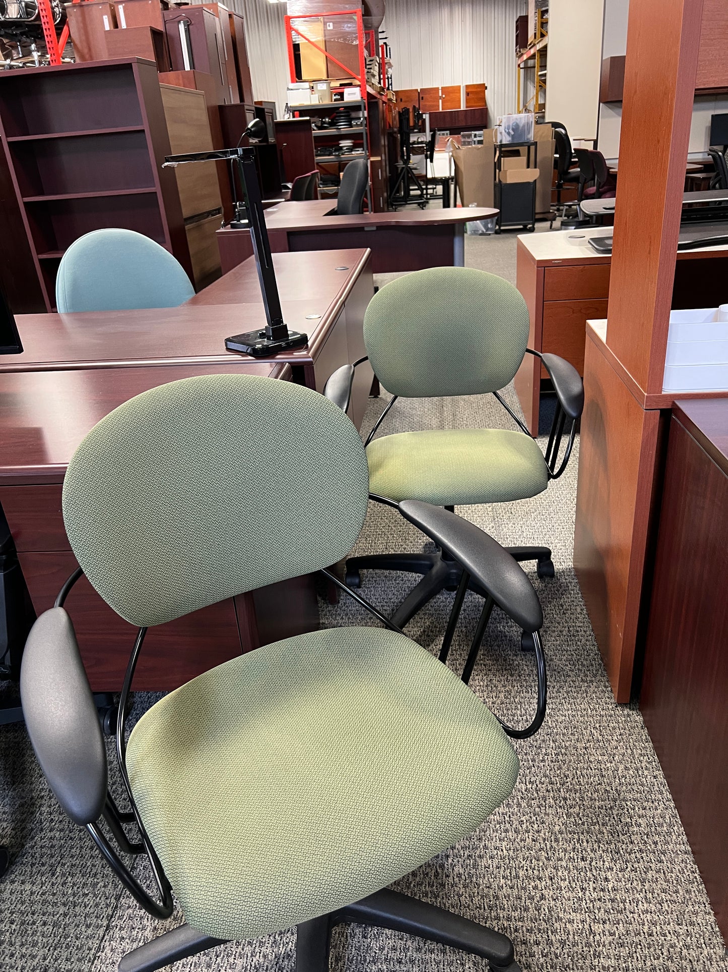 Chairs: Green task chair on casters