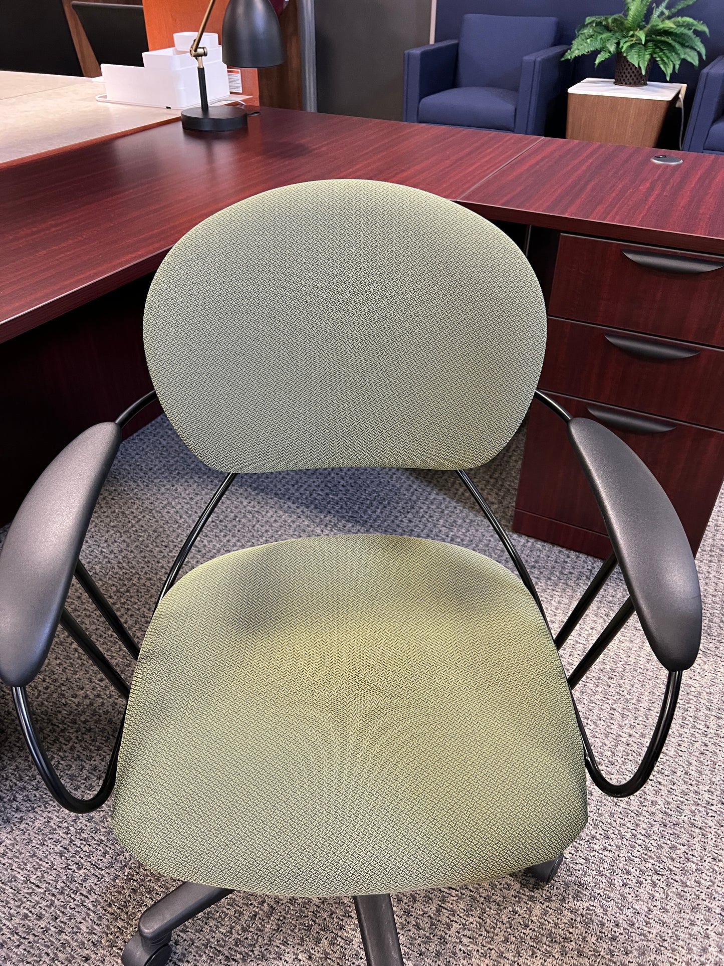 Chairs: Green task chair on casters