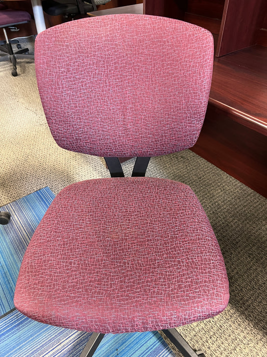Chairs: Deep red print task chairs on casters